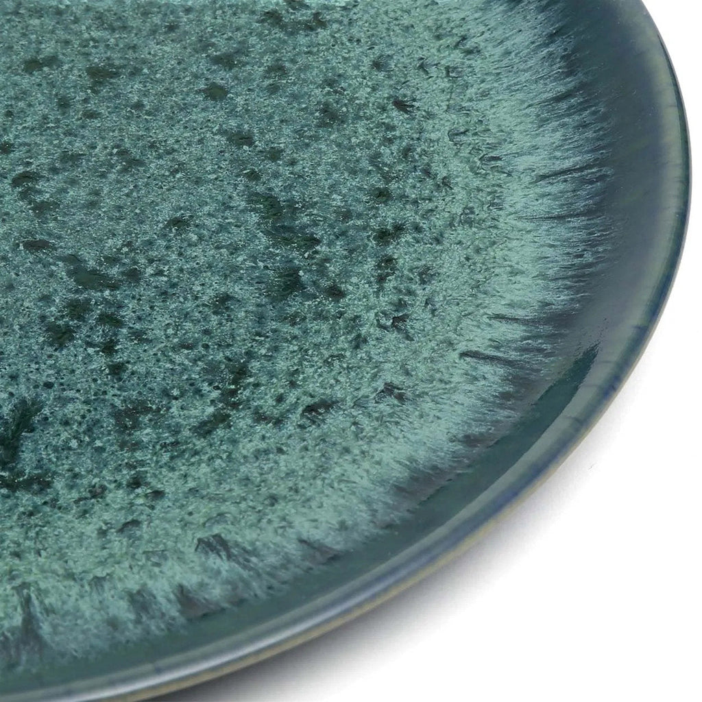 Assiette en grès émaillé vert teal effet moucheté halo radial