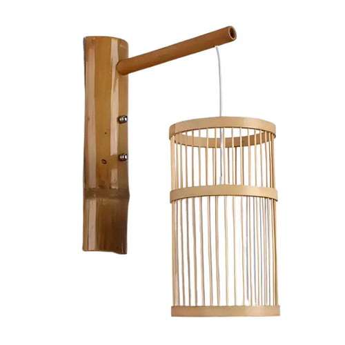 Détail du tressage en bambou naturel de l'applique murale cylindrique