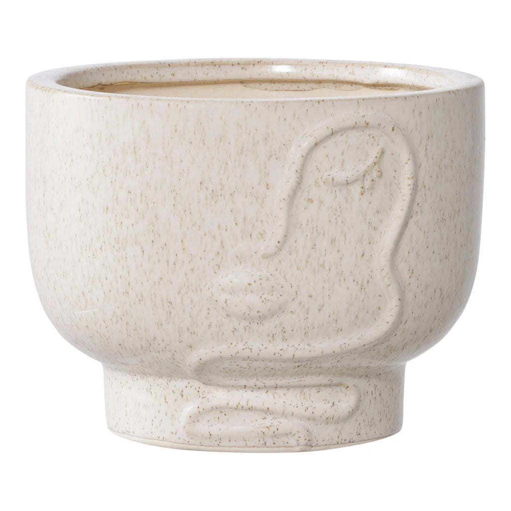 Cache-pot rond en céramique beige mouchetée avec visage abstrait en relief