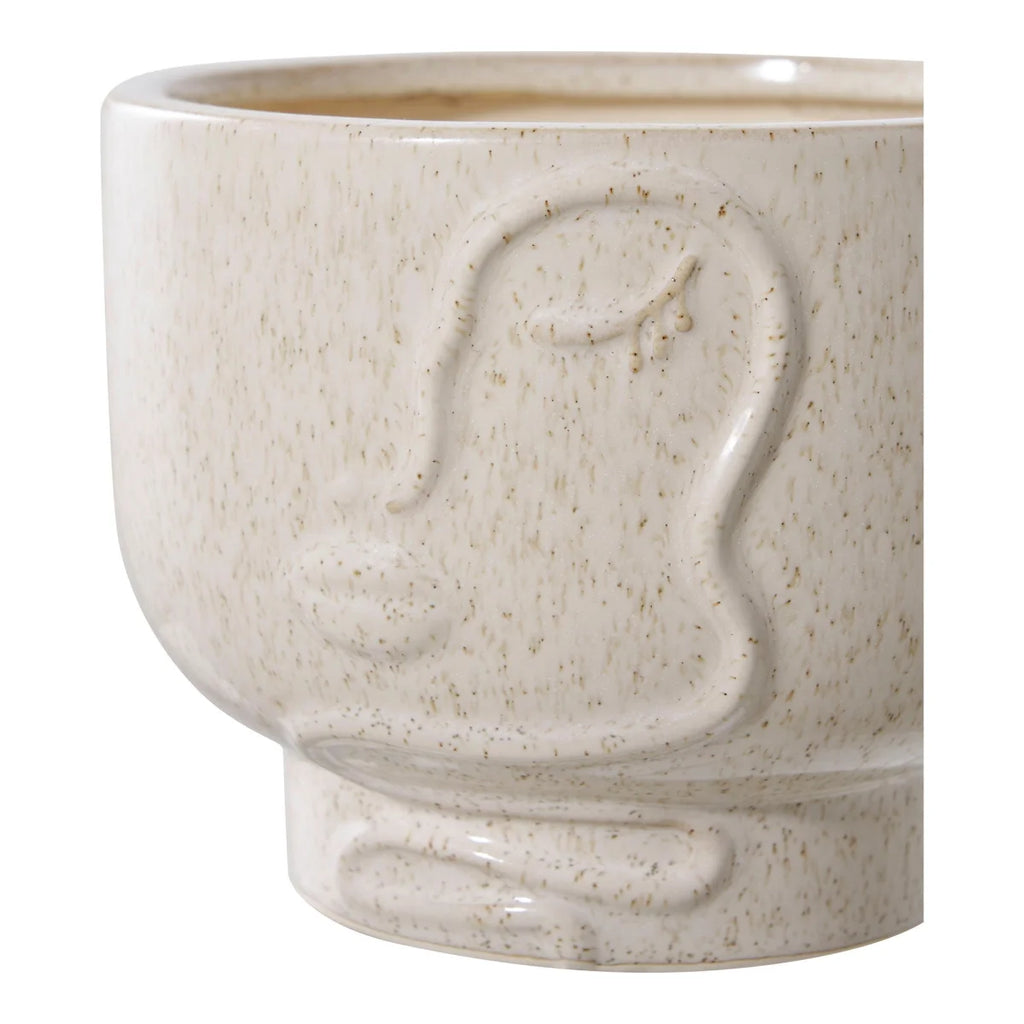 Cache-pot rond en céramique beige mouchetée avec visage en relief ovale texturé
