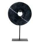 Disque décoratif en marbre noir sur socle métallique