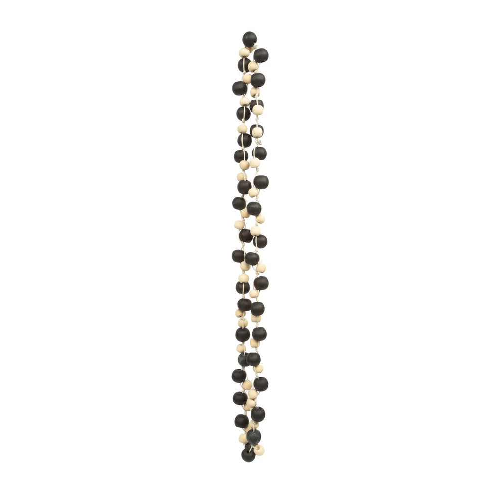 Bracelet perlé noir et blanc au design moderne torsadé