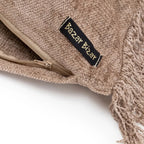Housse de coussin en velours béton beige avec fermeture éclair et label Bazar Bizar