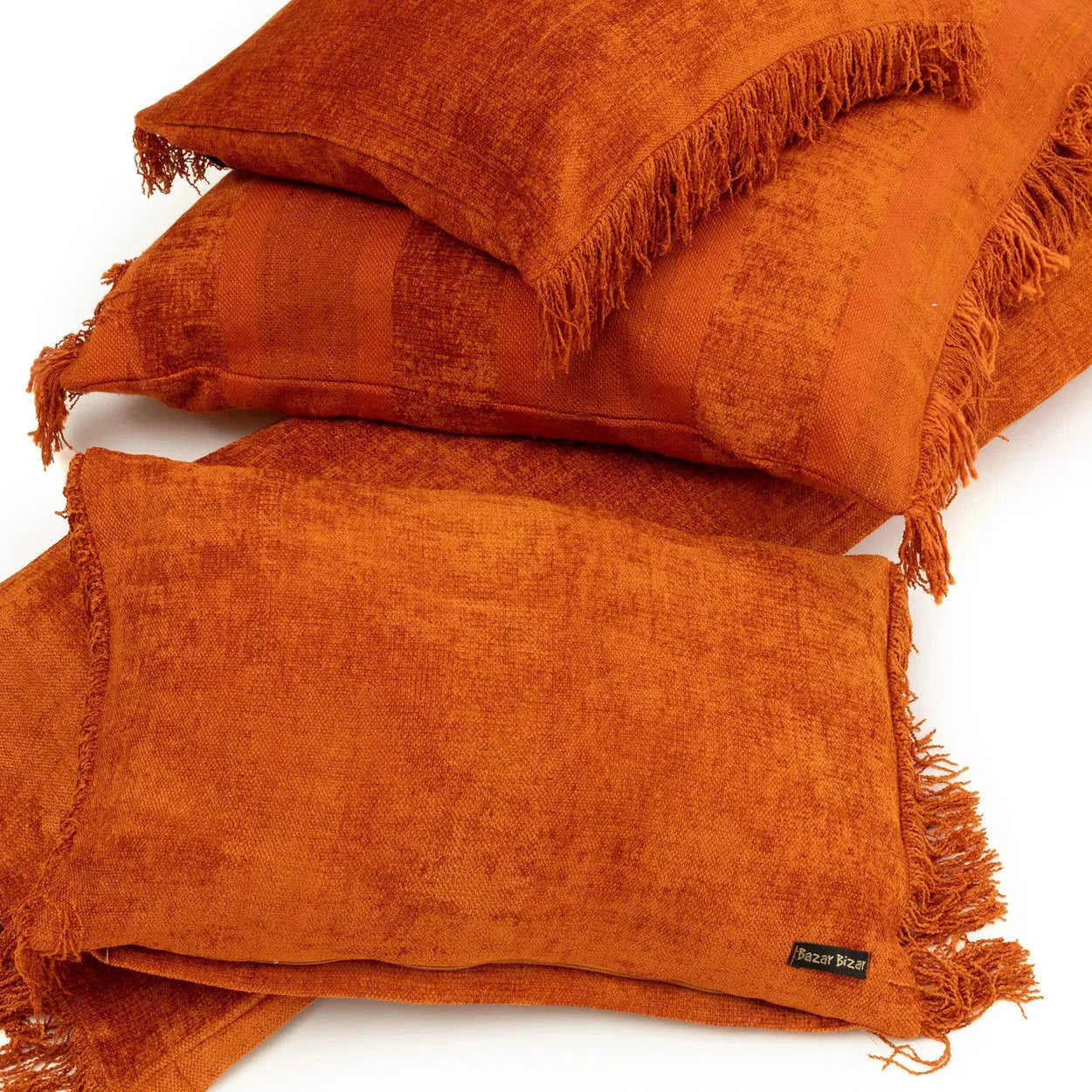 Housse de coussin velours rouille texturé 35x100 cm avec franges