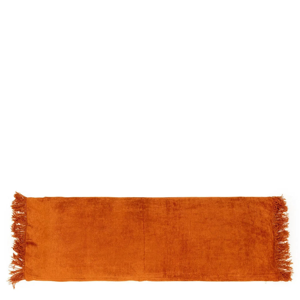 Housse de coussin velours rouille orange à glands 35x100 cm