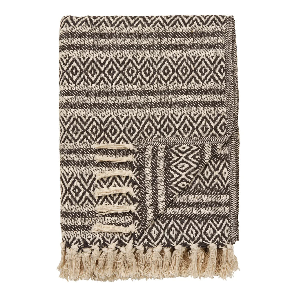 Couverture en coton recyclé beige et noir à motifs losanges avec franges