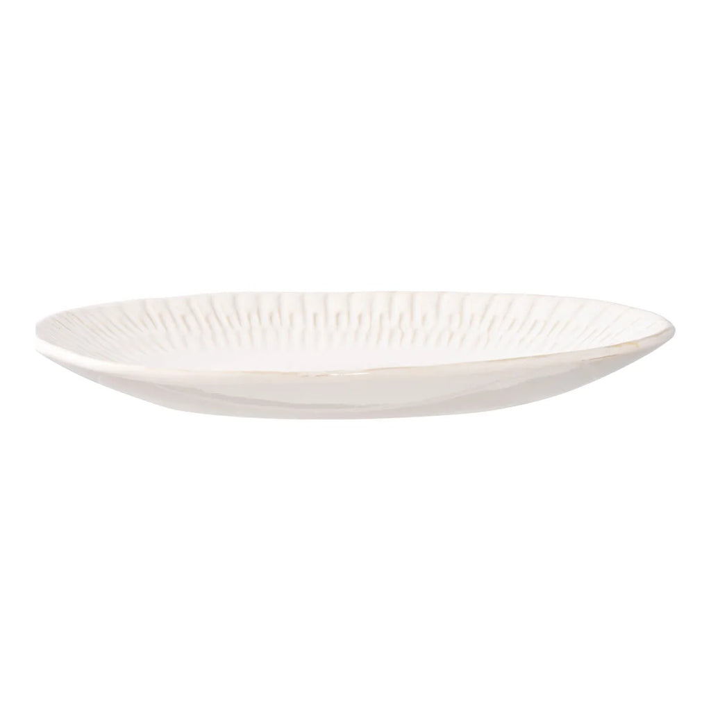 Assiette ovale en céramique blanche striée, finition brillante texturée au bord