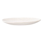 Assiette ovale en céramique blanche striée, finition brillante texturée au bord
