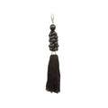 Porte-clés pompon en perles de bois noir avec fermoir argenté