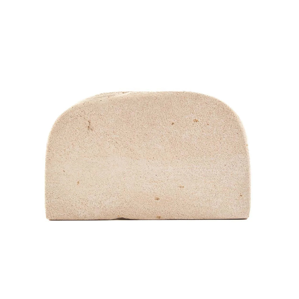 Porte-serviettes en pierre naturelle beige forme arche texturée