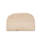 Porte-serviettes en pierre naturelle beige forme arche texturée