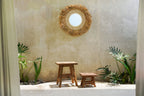 Miroir rond en paille tissée avec franges, parfait pour une décoration naturelle