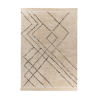 Tapis tufté écru avec motifs noirs géométriques et franges, en coton
